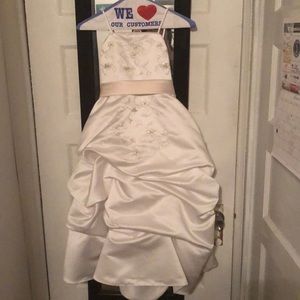 Children’s white evening gown with bow